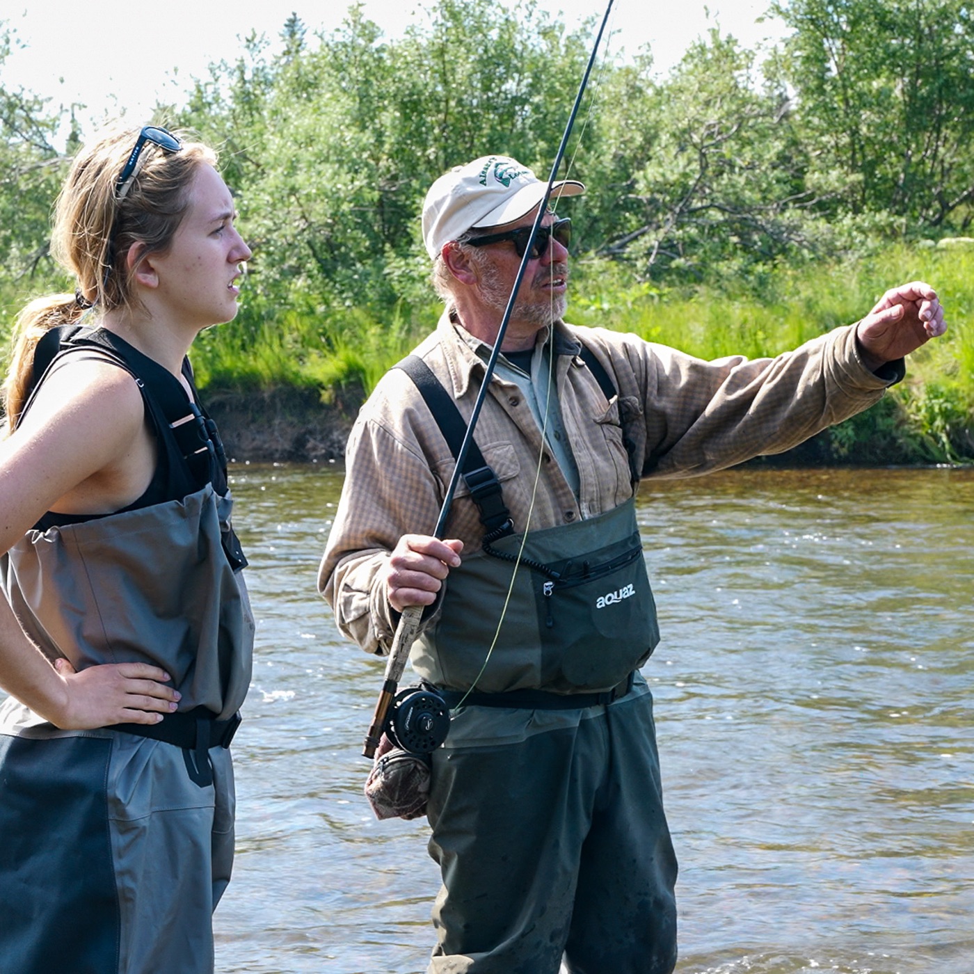 Jack coaching a first-time fly angler
